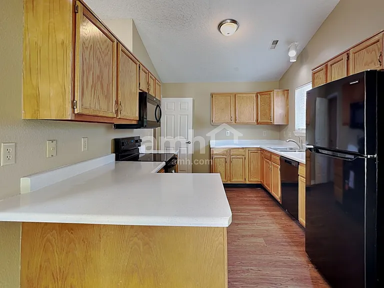 8018 Bitternut Dr — Photo 3