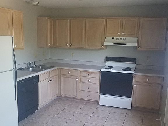 Kitchen with door to back deck.