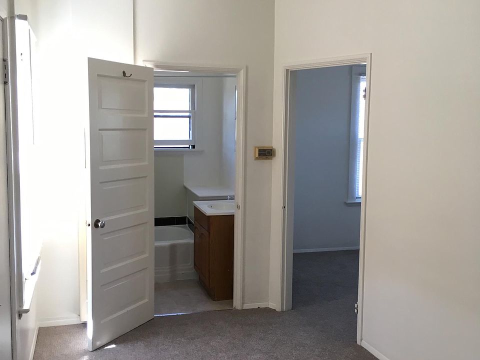 From entry toward bathroom and kitchen