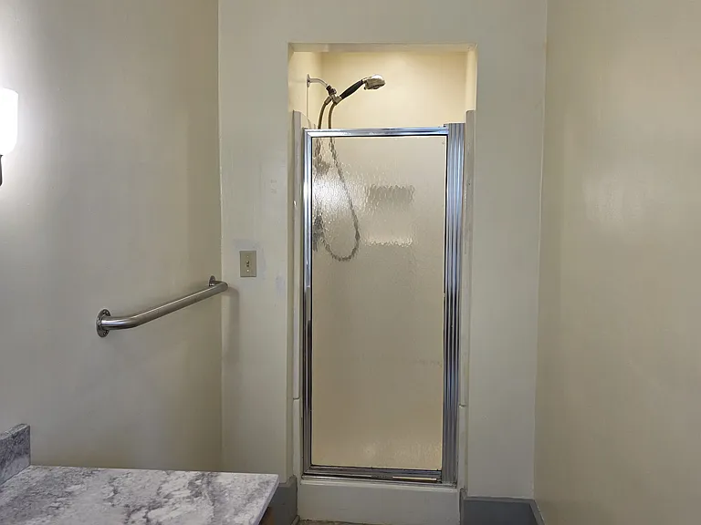 Viewing the shower inside the master bedroom.