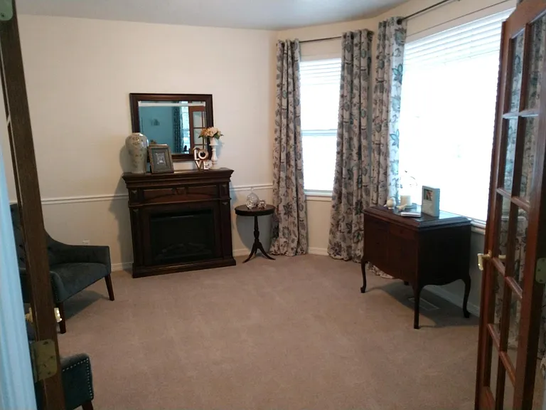 Front parlor, sitting room or office space.