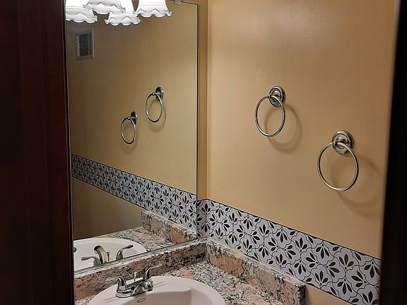 Powder room with new granite countertop
