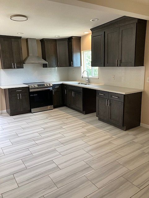 Kitchen showing plenty of storage cabinets