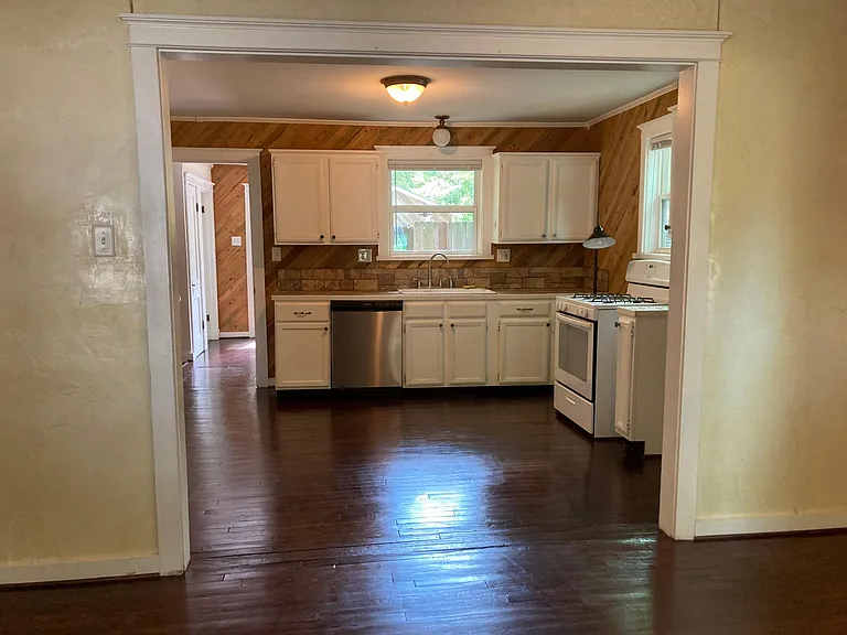 Opening into kitchen from living room