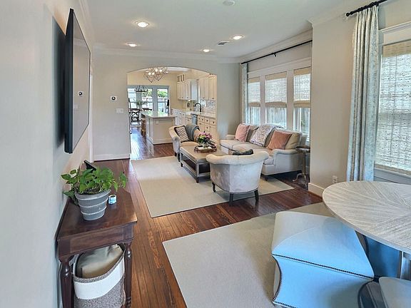 Your view of the Living Room and Kitchen as you enter the front door