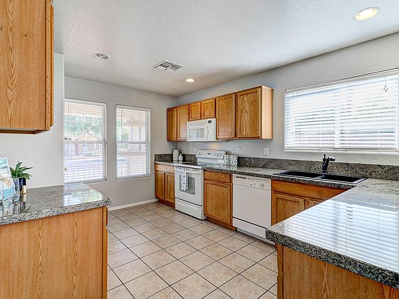3rd image of 15411 W Desert Mirage Dr