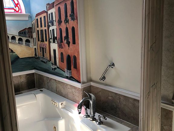 Master bathroom with soaking tub and separate shower