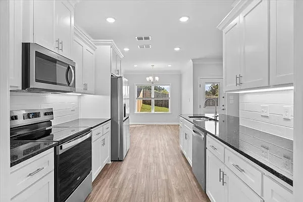 The Town Homes at Lindsey Park — Photo 2