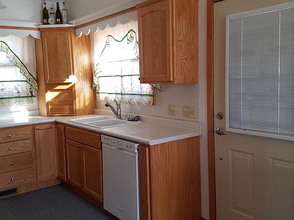 Front door and kitchen