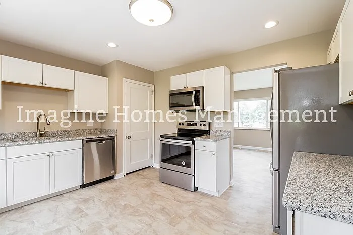 8587 Kenwood Rd — Photo 7
