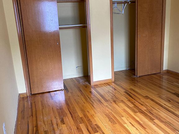 double closets in queen size bedroom