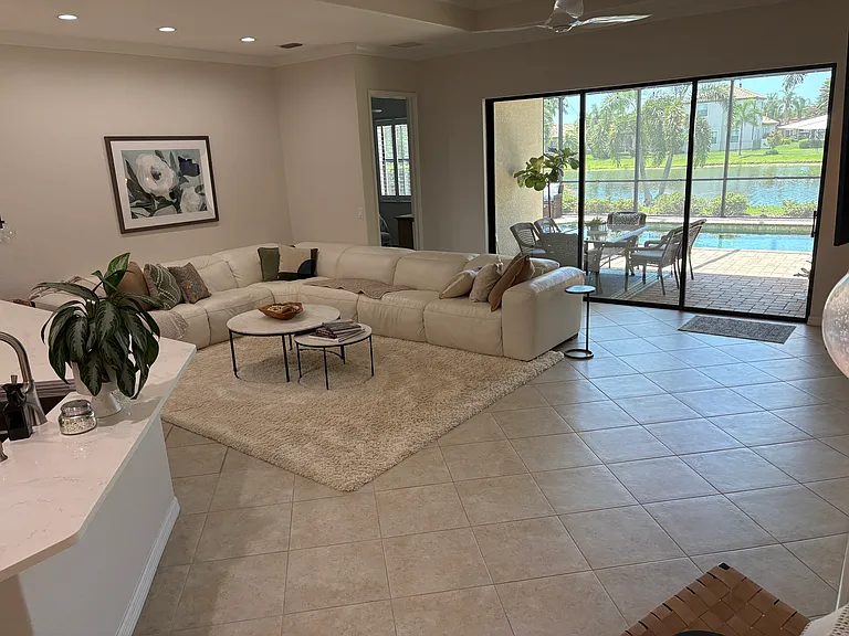 Family room with view of pool and lake