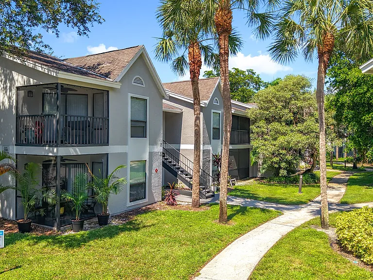 Enjoy a tranquil setting with screened-in patios and walking trails throughout the community.
