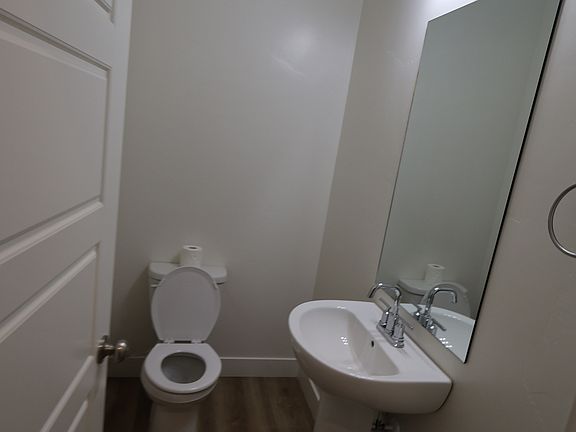 1/2 Bath off of the Kitchen