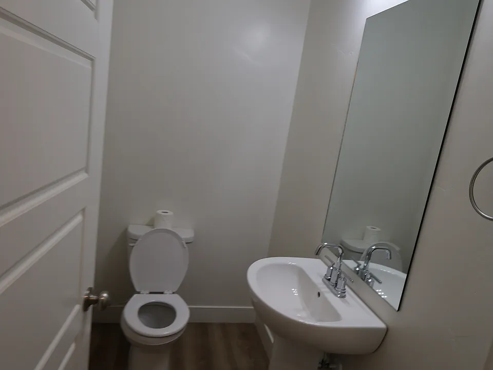 1/2 Bath off of the Kitchen