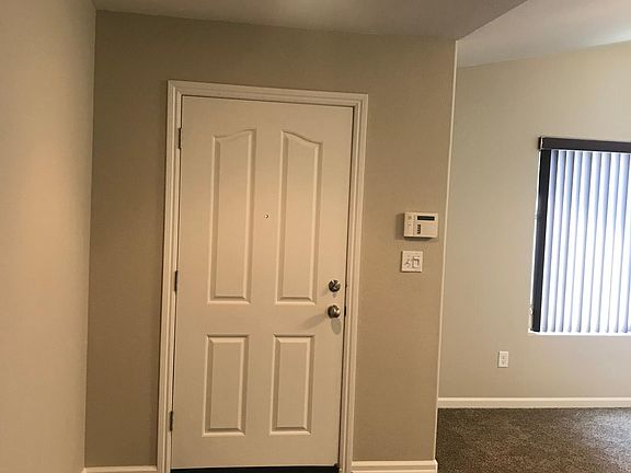 Entrance. New vinyl plank flooring and carpet.