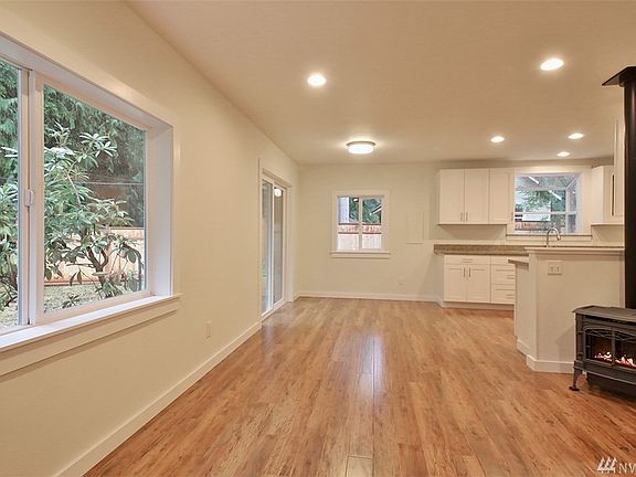 Open floor plan with solid surface Pergo floors throughout.
