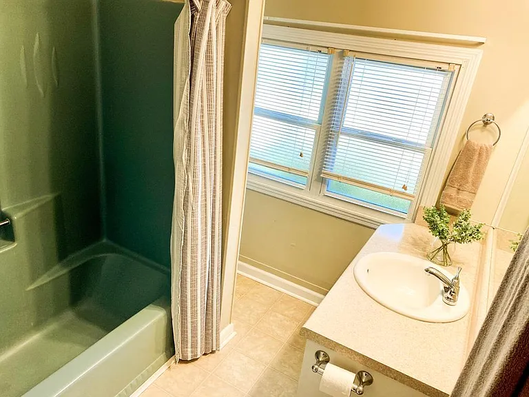 Tub in bathroom.