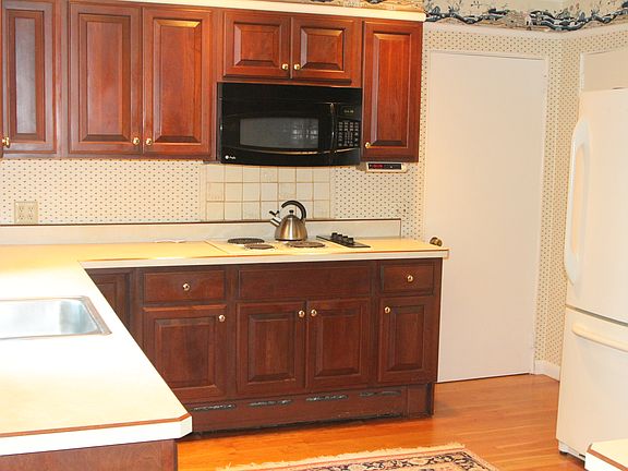 Kitchen/ cherry cabinets  & floor