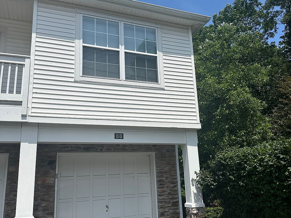 First Floor, End Unit with Attached Garage and Storage