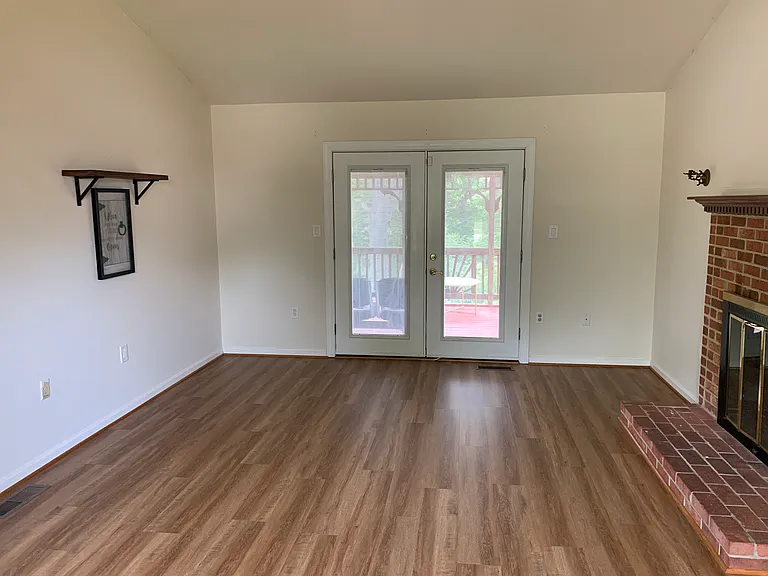 Livingroom view to screened in Balcony