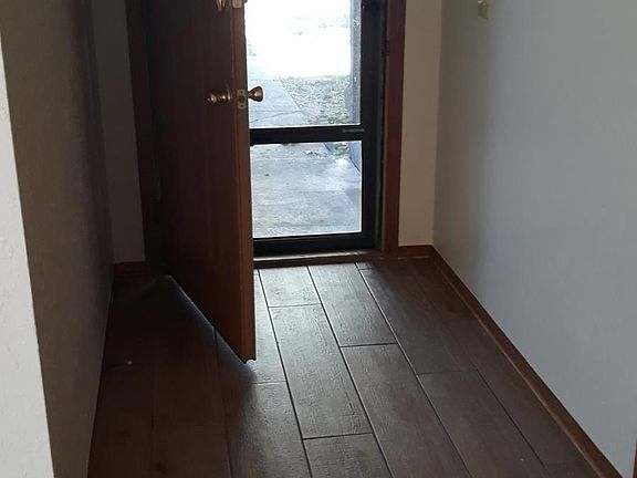 Looking out from living room to front door