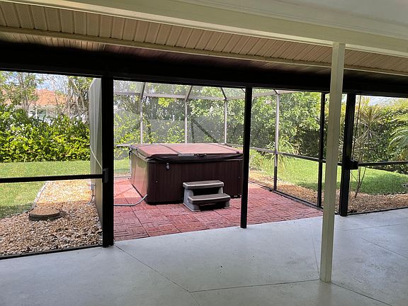 Large screened in hot tub