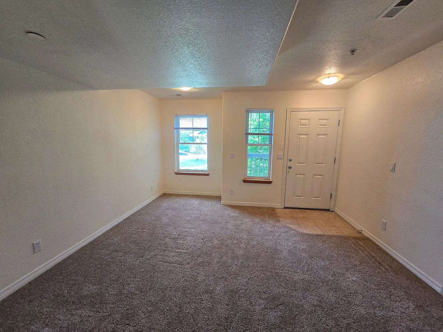 Covered parking covered private deck Dakota Ridge 2 Bedroom 2.5 Bath Condo — Photo 3