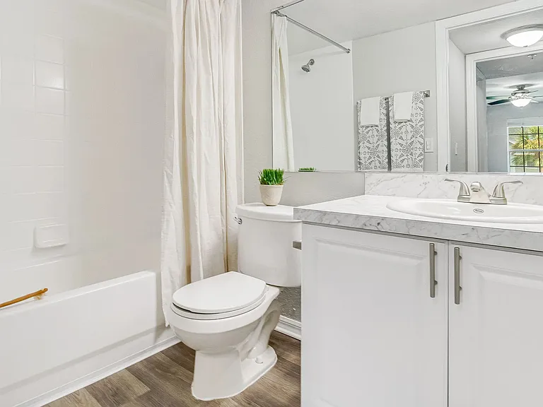 Immerse yourself in modern luxury with brilliantly updated bathrooms exuding contemporary sophistication.