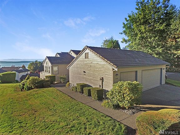 Spacious end unit on a corner with private driveway.