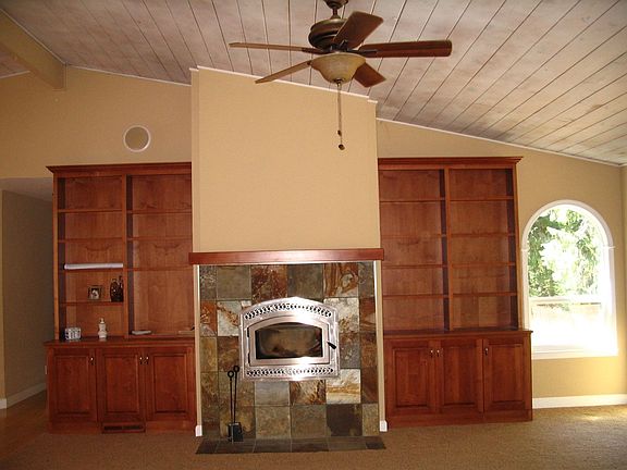 Liv. Rm With Wood Fireplace, Blt-in Bookshelves, Bay Window