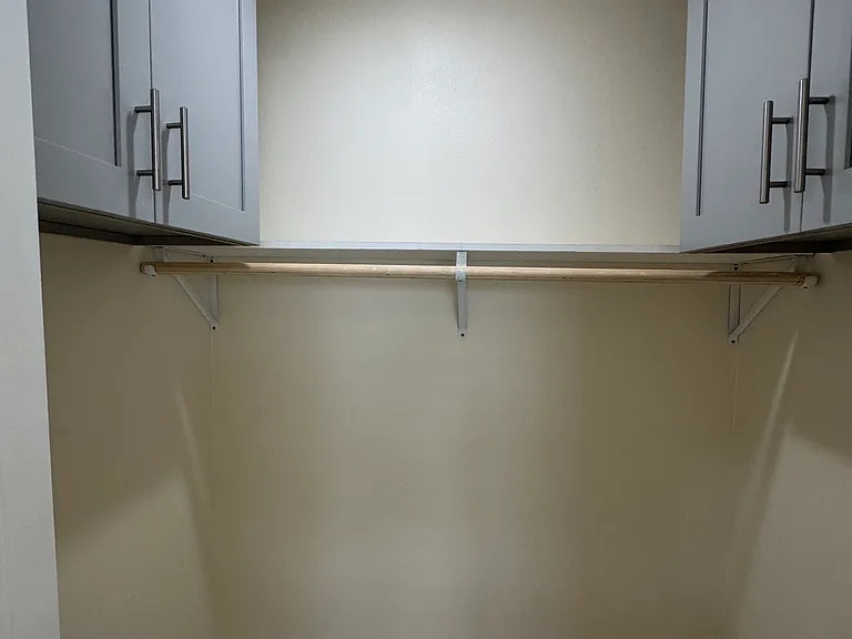 Spacious Closet with cabinets