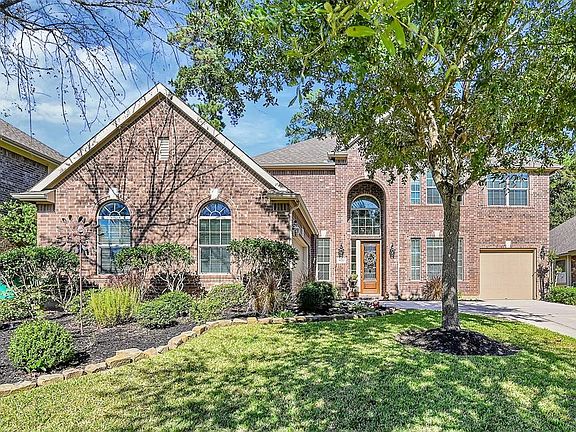 This shaded lot has plenty of room between houses, new landscaping and full yard sprinkler system.