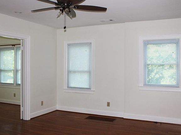 Two front rooms divided by a French door