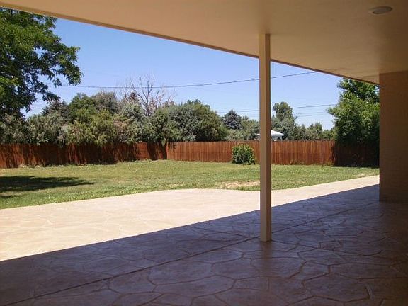 Stamped Concrete/covered patio and large, private back yard