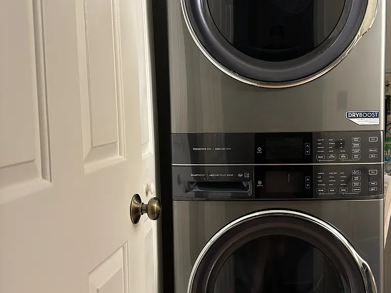 brand new Electrolux washer/dryer center in unit