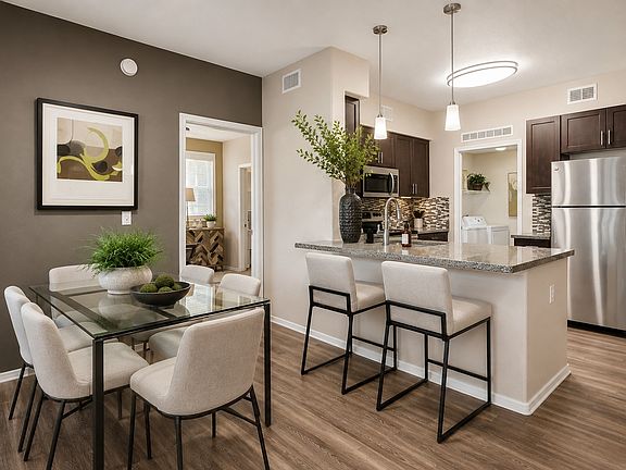 Step into modern elegance at Highland Groves at Morrison Ranch. This beautifully designed kitchen and dining area offer both style and functionality, ideal for your daily living. Explore your future home today!