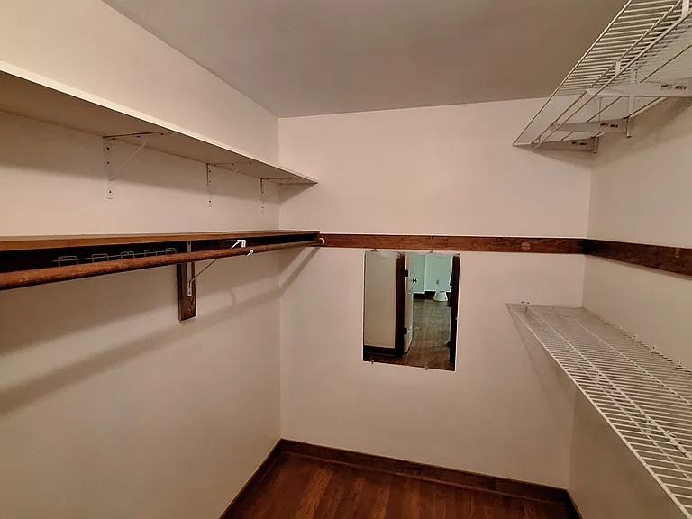 Walk-in closet in Primary Bedroom