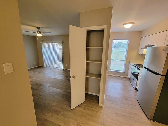 Facing living room and kitchen from dining area