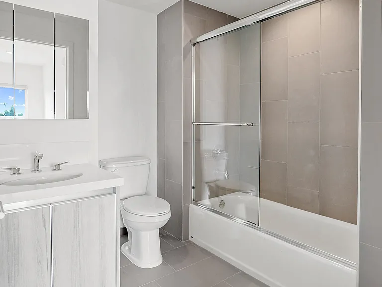 Bathroom with Bathtub with Glass Doors