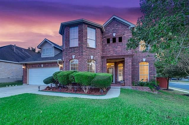 Beautiful 100% brick home on nicely landscaped corner lot
