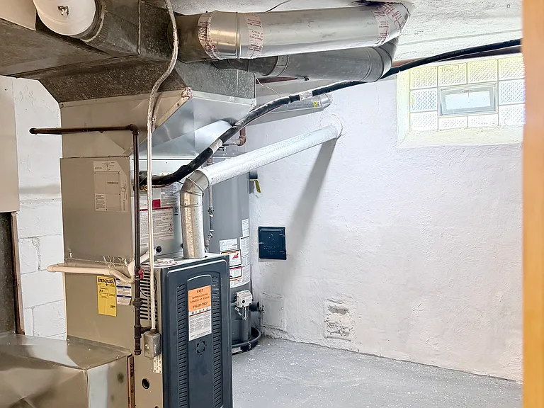 New 2026 high-efficiency American Standard HVAC system | Energy efficient | Fireplace ash clean-out access in basement