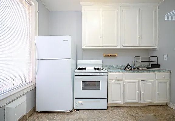 5th image of 930 59th St APT 6