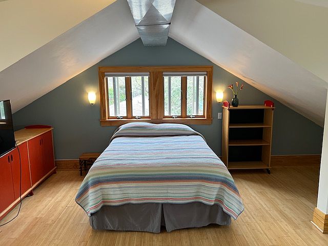 Queen bed, east facing, with plenty of storage