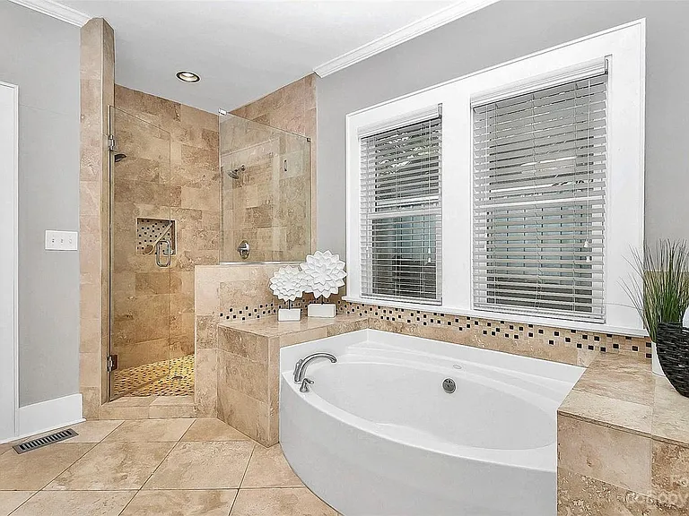 Large master bathroom with independent deep tub and shower