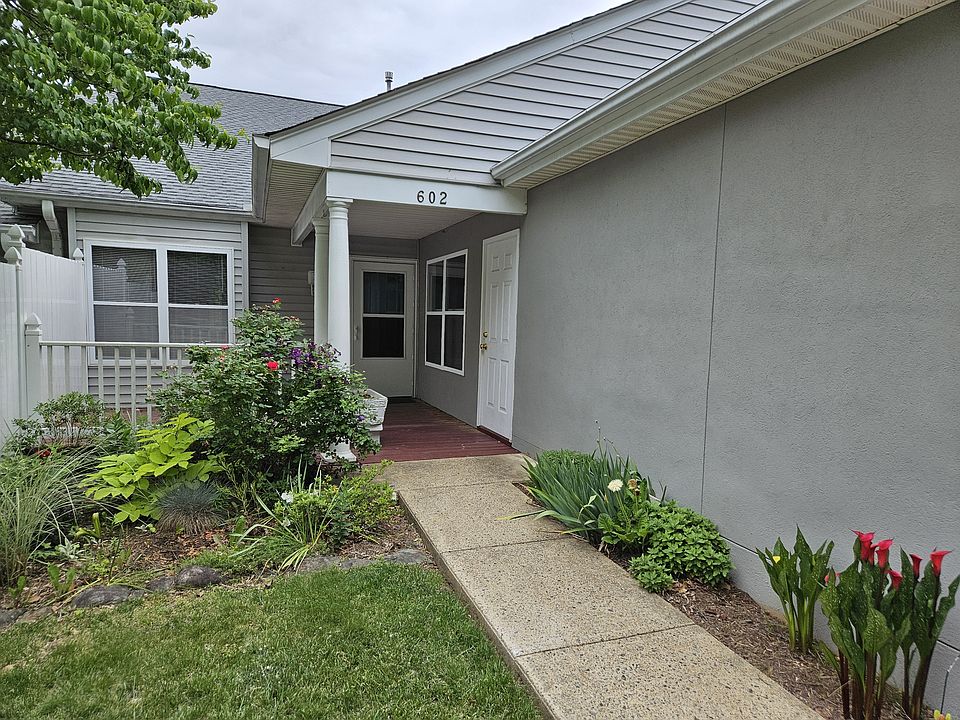 Established garden, covered front porch.