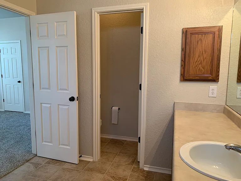 Primary Bathroom (facing bedroom)