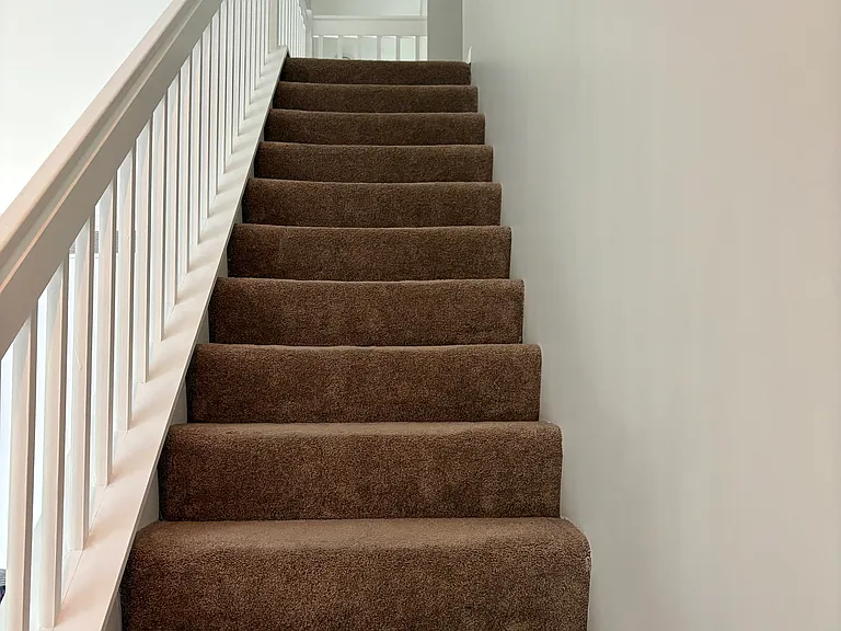 Stairs from living room to Bedroom #2