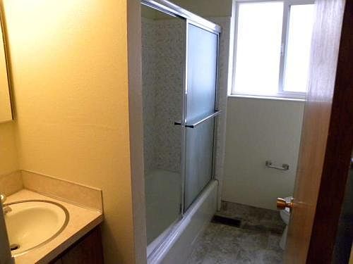Bathroom with tub and shower