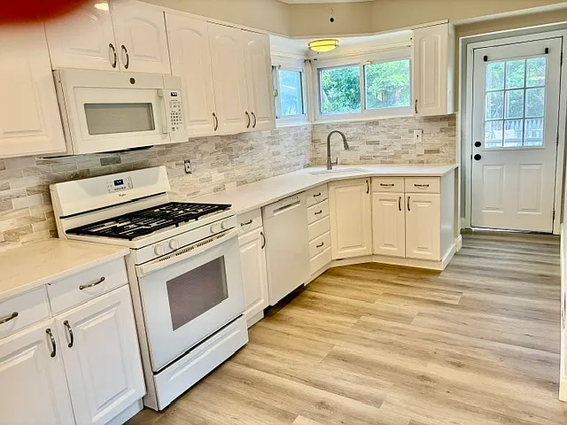Kitchen with Outside Entrance to Deck